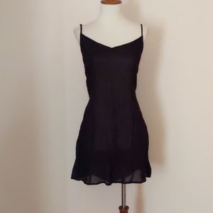 NWOT. Free People Black adjustable strap tank top